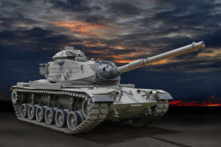 Military tank with sunset skies in backgroundのeditorial素材
