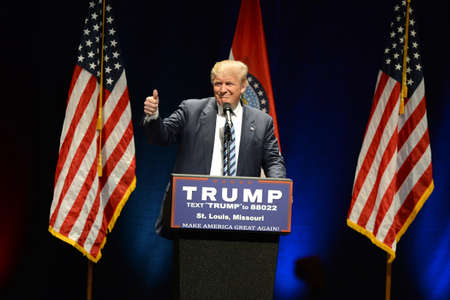 Saint Louis, MO, USA - March 11, 2016: Donald Trump shows the thumbs-up to supporters at the Peabody Opera House in Downtown Saint Louis.のeditorial素材
