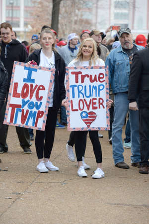 Saint Louis, MO, USA - March 11, 2016: Donald Trump supporters hold signs rally outside the Peabody...