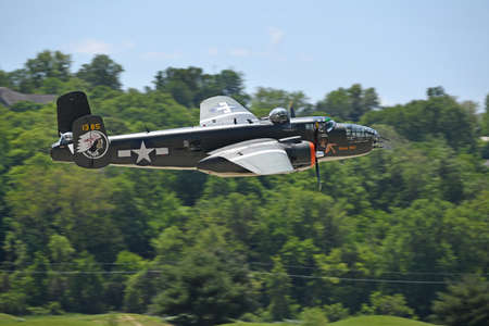 Saint Louis, MO, USA â€“ May 15, 2016: B-25 Mitchell bomber flying at the Spirit of Saint Louis...