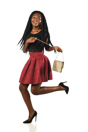 Young African American woman smiling isolated over white backgroundの写真素材