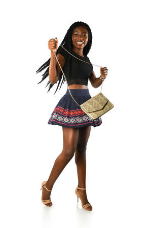 Portrait of happy African American woman isolated over white backgroundの写真素材