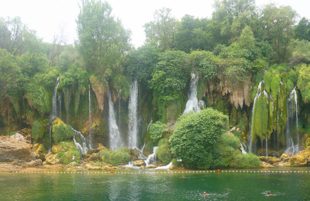 Kravice waterfalls in Bosnia and Herzegovina. Green background.の写真素材