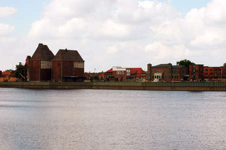 The photography of an old industrial site on the River Elbe from the city Wittenberge               ...