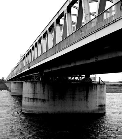 The photograph of a railway bridge  Wittenberge, Brandenburg  and the matching rail distance about the river Elbe                      の写真素材