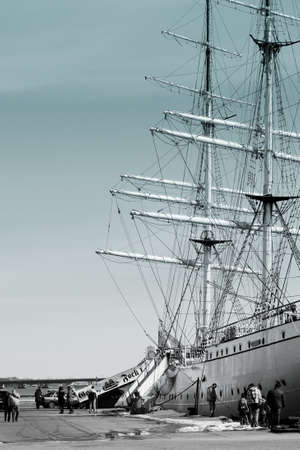 Stralsund, Mecklenburg-Western Pomerania / Germany  April 06, 2013: Tourists visiting and anglers fishing at the Gorch Fock April 06, 2013 in the port of Stralsund. The Gorch Fock is a sailing school ship of the German Navy.The Gorch fore                のeditorial素材