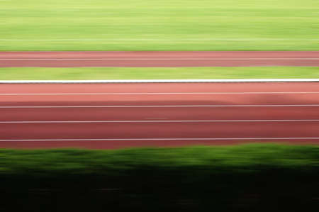 The photograph of a 100 m track in a stadium                      