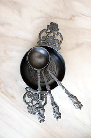 The close-up of zinc spoons in a metal bowl                 の写真素材