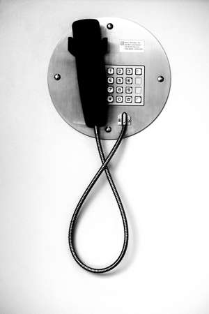 The close-up of a public phone in monochrome          の写真素材