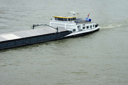 The photograph of a cargo ship on the river Rhine via birds eye view                     の写真素材