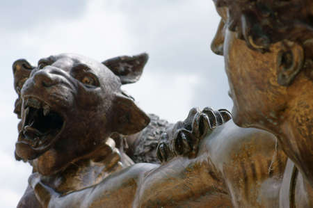 Schwerin, Mecklenburg-Western Pomerania   Germany - August 11, 2013  The Sculpture  Shepherd and dog, attacked by a Panther   from the sculptor Julius Francis on 11 August 2013 in the Schwerin Castle Garden                    のeditorial素材