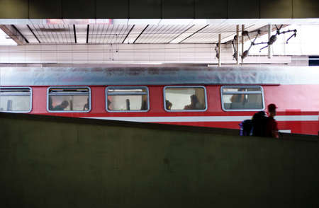 Kassel, Germany - August 4, 2013  The Photography of Kassel station Wilhelmshöh with unknown people passing a train on August 04, 2013 in Kassel                     のeditorial素材