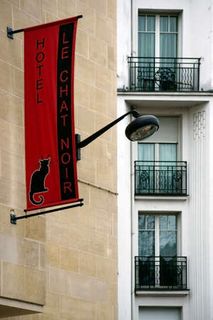 Paris, France - January 1, 2014  The entrance sign for the hotel Le chat noir in the famous Montmartre district on January 01, 2014 in Paris                       のeditorial素材