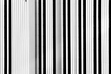 The abstract black and white photograph of the facade of a skyscraper               