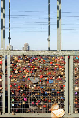 The Photography of love locks on the fence of the Hohenzollern Bridge in Cologne            