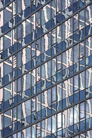 The abstract photograph of skyscraper reflections in a skyscraper facade              