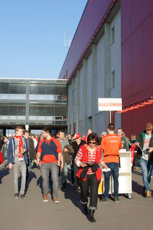 Mainz, Germany - March 9, 2014  Fans of 1  FC Mainz 05 are going to a soccer match in the Co Face Arena on March 09, 2014 in Mainz                      のeditorial素材