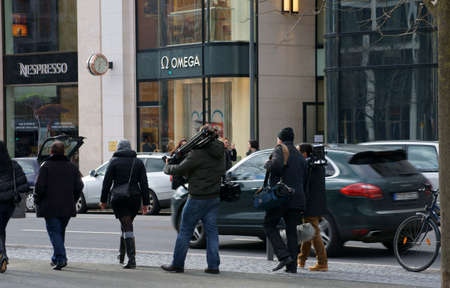 Frankfurt, Germany - February 19, 2014  A film crew goes with camera and equipment along the Roßmarkt on February 19, 2014 in Frankfurt                   のeditorial素材