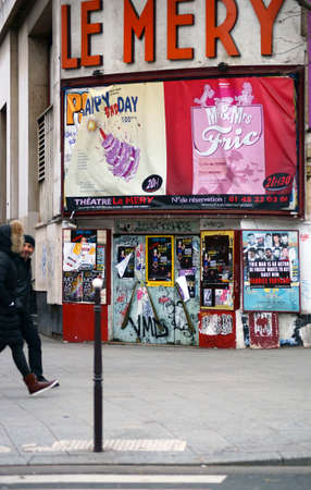 Paris, France - January 1, 2014  Pedestrians pass the theater Le Mery in the Montmartre area on January 01, 2014 in Paris                  のeditorial素材
