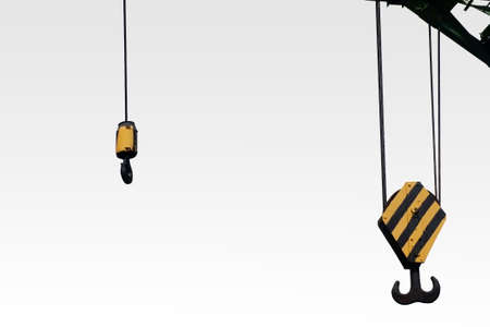 The photograph of two different winds of a lifting crane with hook                     の写真素材