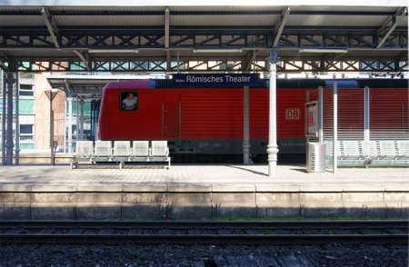 Mainz, Germany - March 2, 2011  A train driver looks backwards out his train window at the station Mainz Roman Theater on March 02, 2011 in Mainz                    のeditorial素材
