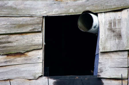 The photograph of a smoke exhaust pipe of a smokehouse.の写真素材