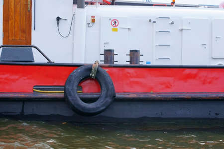 The side view of a ship with a view of the engine compartment.