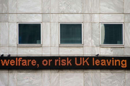 A digital display panel to the facade of an office building.の写真素材