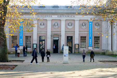 London, UK - November 29, 2014: Visitors and tourists staying in front of the tourist office of the...