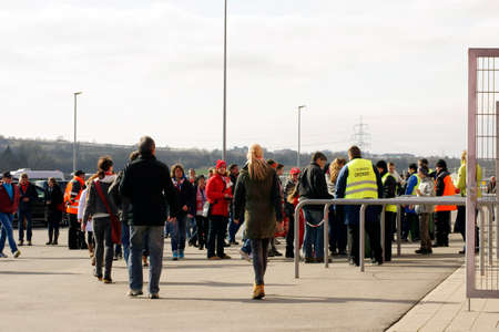 Mainz, Germany - March 22, 2015: Fans of the soccer club FSV Mainz 05 waiting outside the entrance...