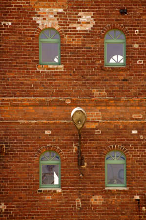 An old brick ruin on the disused industrial site of an old factory.の写真素材