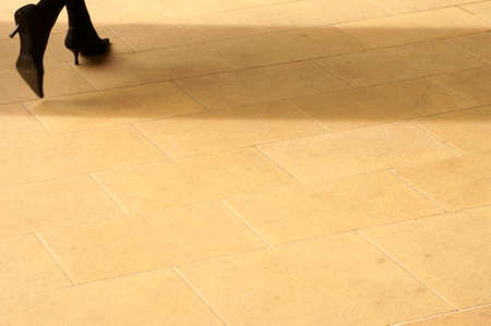 The closeup of women39s legs in high heels on a platform.の写真素材