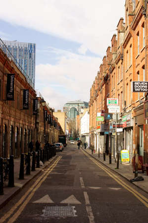 London UK 31 March 2015: Shops and restaurants a tattoo shop in the Fashion Street on March 31 2015 in London.のeditorial素材