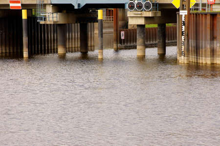 The bridge system of a bascule bridge with signs and traffic lights, and partitions.