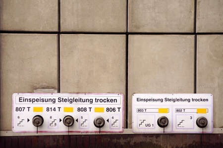 The connections for rising water lines with notes and signs.