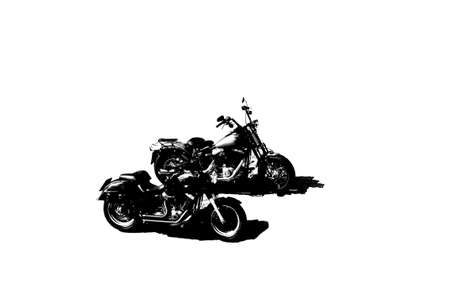 The monochrome isolation of two black motorbikes with shadows on a white background.の写真素材