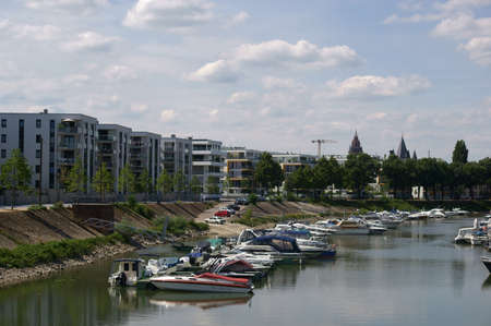 Mainz, Germany - July 25, 2015: The river port on the Victor-Hugo-shore with motor boats and small...