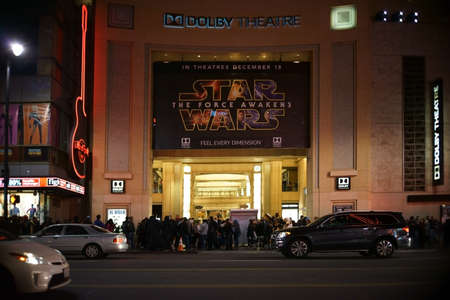 Los Angeles, United States - December 27, 2015: A queue of people is waiting outside the theater on Hollywood Boulevard to watch the movie Star Wars Rise of the power on the night of December 27, 2015 in Los Angeles.のeditorial素材