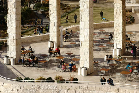 Los Angeles, United States - December 27, 2015: Museum visitors sit on an outside terrace of the Getty Center on tables and chairs in the cafe on December 27, 2015 in Los Angeles.のeditorial素材