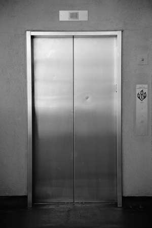 The close-up of a passenger elevator with automatic sliding doors.