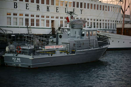 San Diego, United States - December 25, 2015: A escort boat is moored near the ferry Berkeley in the port of the maritime museum San Diego on December 25, 2015 in San Diego.のeditorial素材