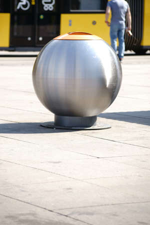 A round and Remarkable waste container made of stainless steel in downtown Berlin.の写真素材