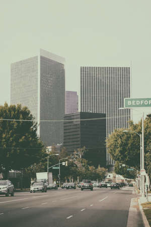 Los Angeles, United States - December 27, 2015: Traffic on a multi-lane road leading to the city center of Los Angeles with different skyscrapers on December 27, 2015 in Los Angeles.のeditorial素材