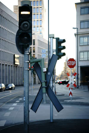 A crossroad in the city center of Frankfurt with various traffic signs.                           