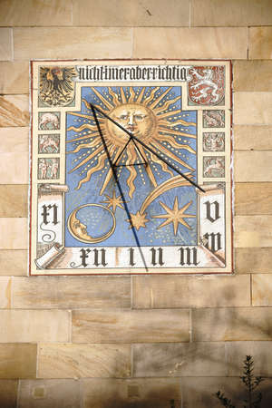 Frankfurt, Germany - January 05, 2017: A historical sundial with various drawings of coat of arms, zodiacal signs and heavenly bodies on January 05, 2017 in Frankfurt.のeditorial素材
