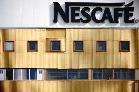 Mainz, Germany - March 24, 2014: The facade of the industrial building of the beverage and coffee maker Nescafe with logo on March 24, 2017 in Mainz.のeditorial素材
