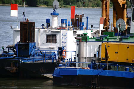 The side view on a ship deck with a cabin and equipment of an industrial ship.