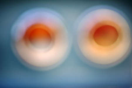 The abstract closeup of a taillight out of focus.の写真素材