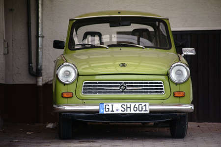 Giessen, Germany - September 30, 2017: The front view of an old vintage car from the trabant in a parking lot on September 30, 2017 in Giessen.のeditorial素材