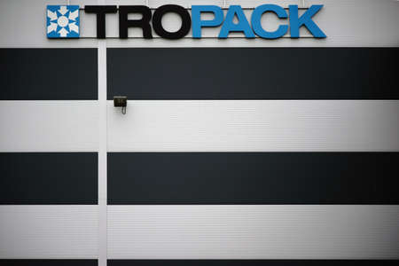 Lahnau, Germany - October 07, 2017: The logo of Tropack, a manufacturer of desiccants and packaging...
